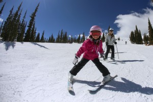 Girl skiing down slopes
