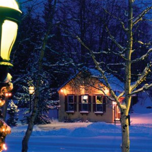 Main street in the snow by night