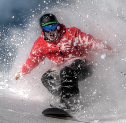 Snowboarder getting a face shot