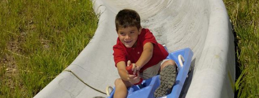 Kid on alpine slide