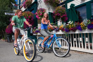 Couple riding bikes by Fatty's