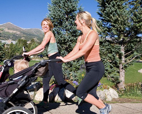 Moms jogging with strollers