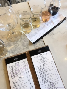Menus and wine glasses at Carboy Winery