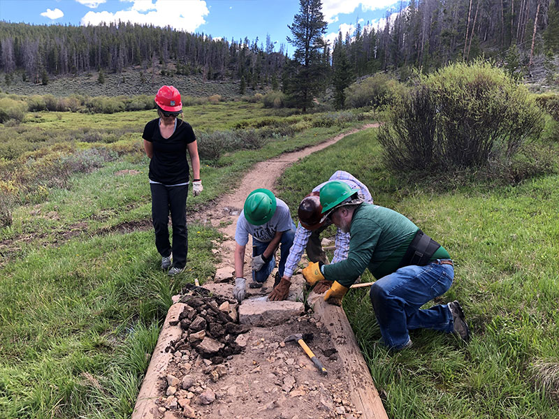 Volunteers working on a trail in Breckenridge.