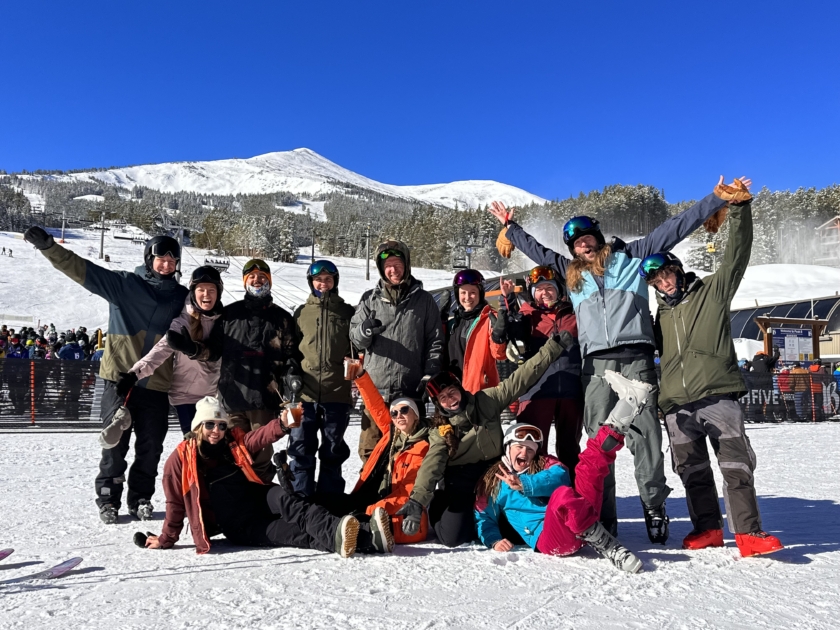 a group of skiers celebrate the start of snow season on Breckenridge Opening Day 