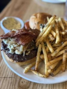 An un-bunned Gold Pan Burger and garlic herb fries